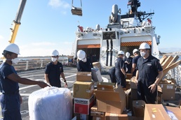 USCGC Stone cranes aboard equipment