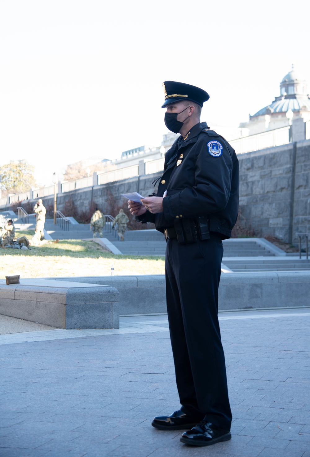 Capt. Andrew Bolinger, from the U.S. Capitol Police, deputizes Soldiers of the Illinois National Guard in Washington, D.C., Jan. 19, 2021