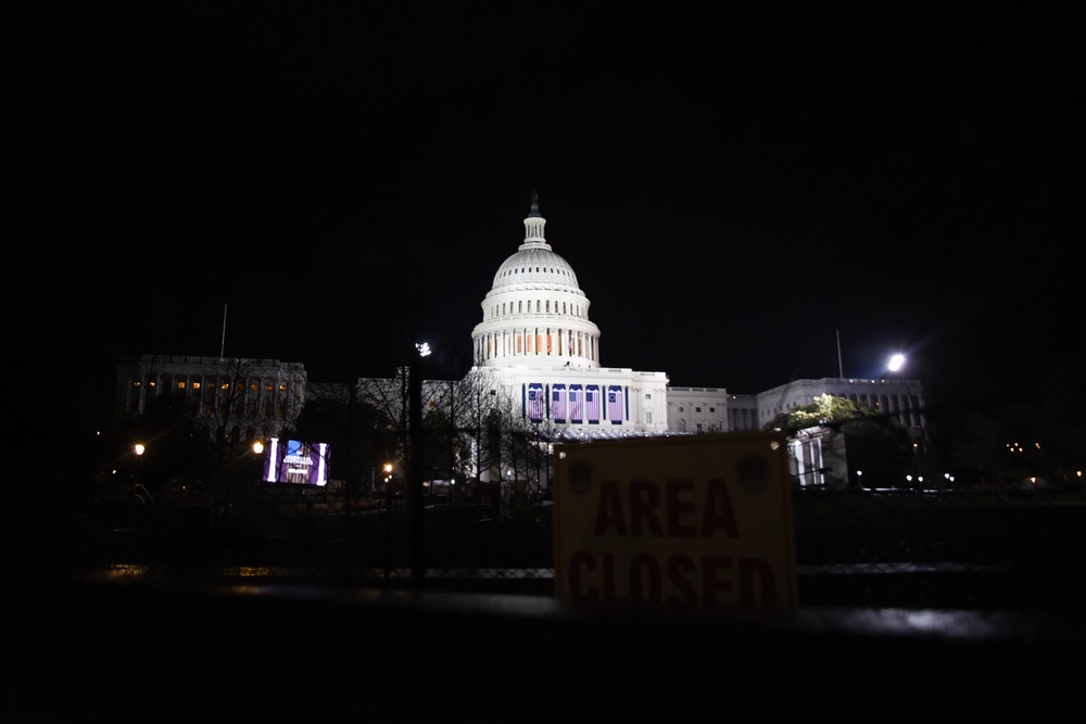 U.S. Soldiers and Airmen with the National Guard, provide security around the U.S. Capitol prior to the inauguration ceremony in Washington, D.C., Jan. 20, 2021