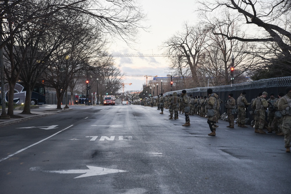 U.S. Soldiers and Airmen with the National Guard, provide security around the U.S. Capitol prior to the inauguration ceremony in Washington, D.C., Jan. 20, 2021