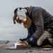 Contractor welds on flight deck aboard USS John C. Stennis (CVN 74)