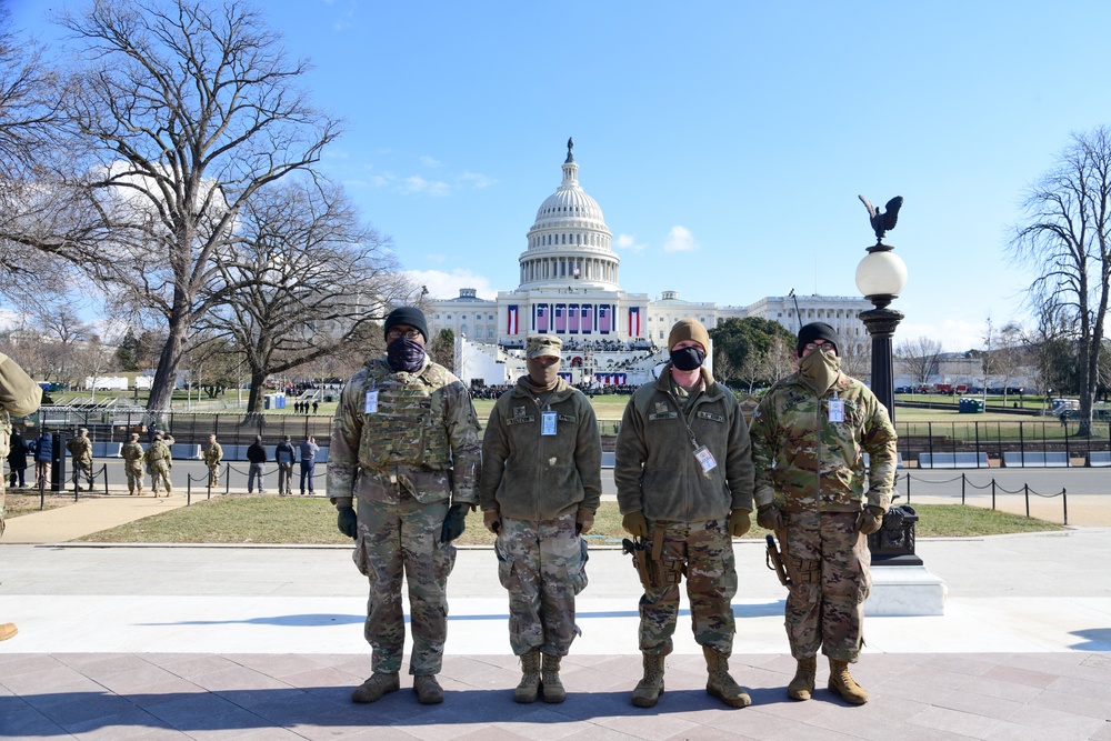 U.S. Soldiers with Alpha Company, 4th Battalion, 118th Infantry Regiment, South Carolina National Guard, pose for a photo in front of the Capitol in Washington, D.C., Jan. 20, 2021