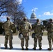 U.S. Soldiers with 3rd Battalion, 121st Infantry Regiment, Georgia National Guard, watch the inauguration in front of the Capitol in Washington, D.C., Jan. 20, 2021