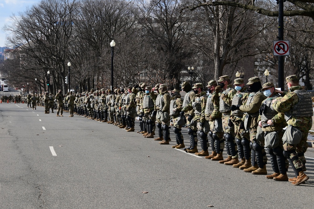 U.S. Soldiers and Airmen with the National Guard provide security around the U.S. Capitol prior to the inauguration ceremony in Washington, D.C., Jan. 20, 2021