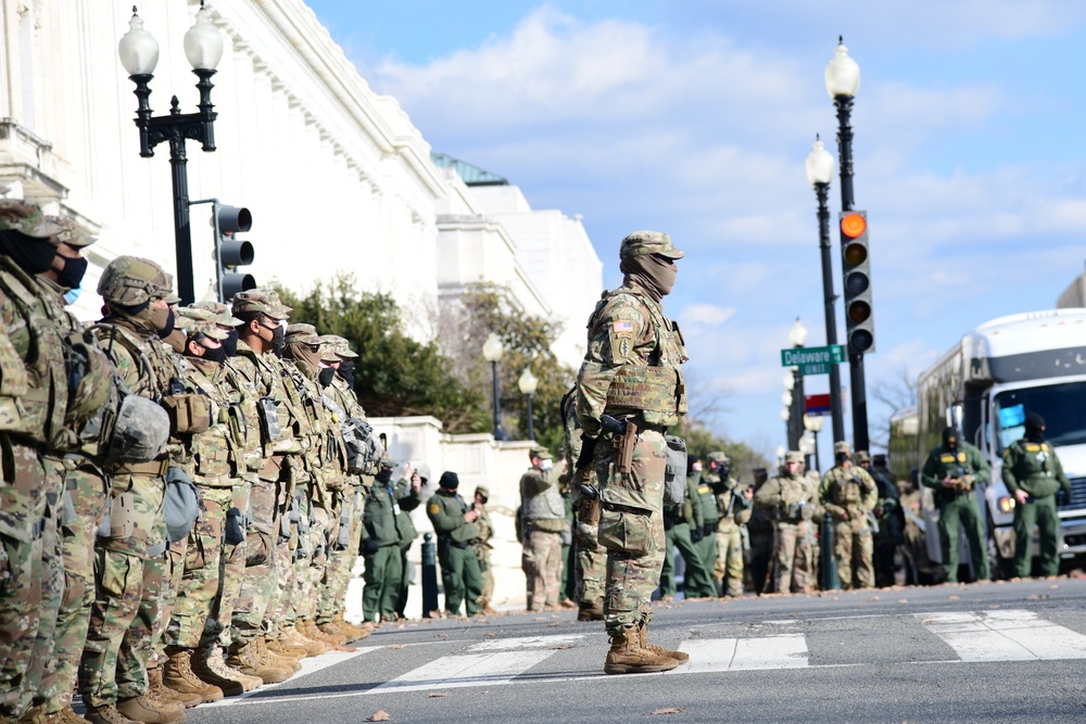 U.S. Soldiers and Airmen with the National Guard provide security around the U.S. Capitol prior to the inauguration ceremony in Washington, D.C., Jan. 20, 2021