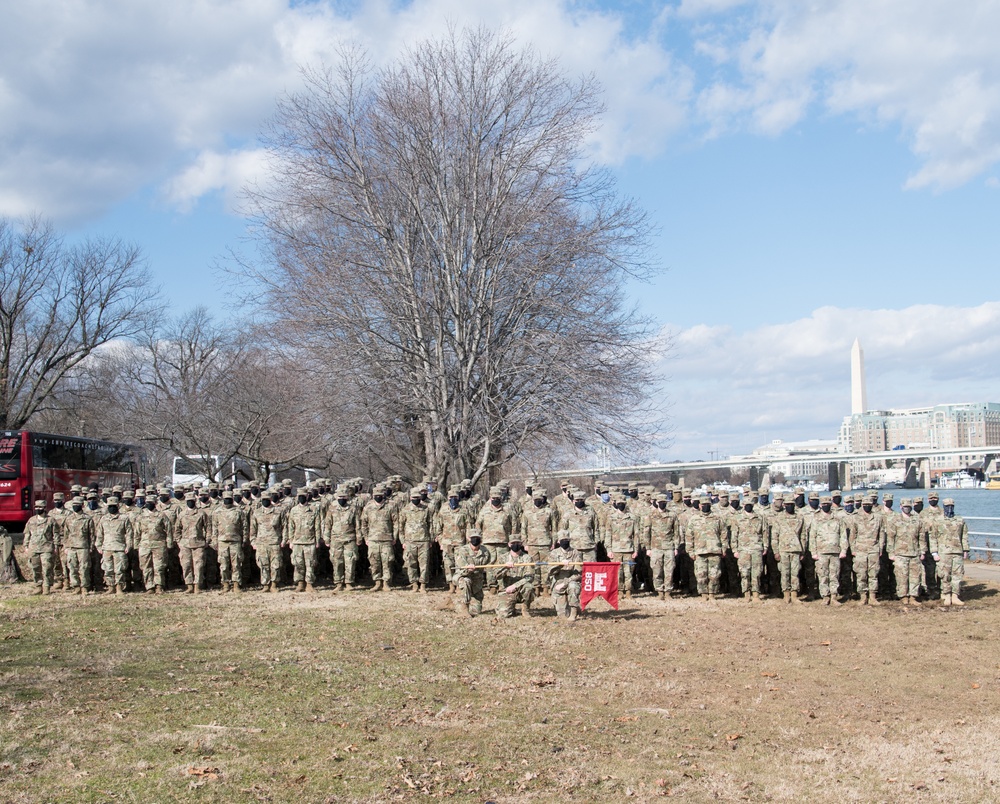 850th Horizontal Engineer Company, MN National Guard, stand in formation for a group photo in Washington D.C.