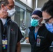 U.S. service members, local medical professional work together