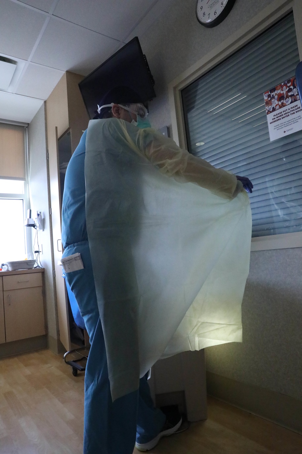 U.S. service members, local medical professional work together