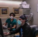 U.S. service members, local medical professional work together