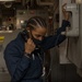 USS America (LHA 6) Sailor reports a simulated casuaty during drill.