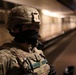 A North Carolina National Guard Soldier provides security in the L'Enfant Plaza Metro Station.