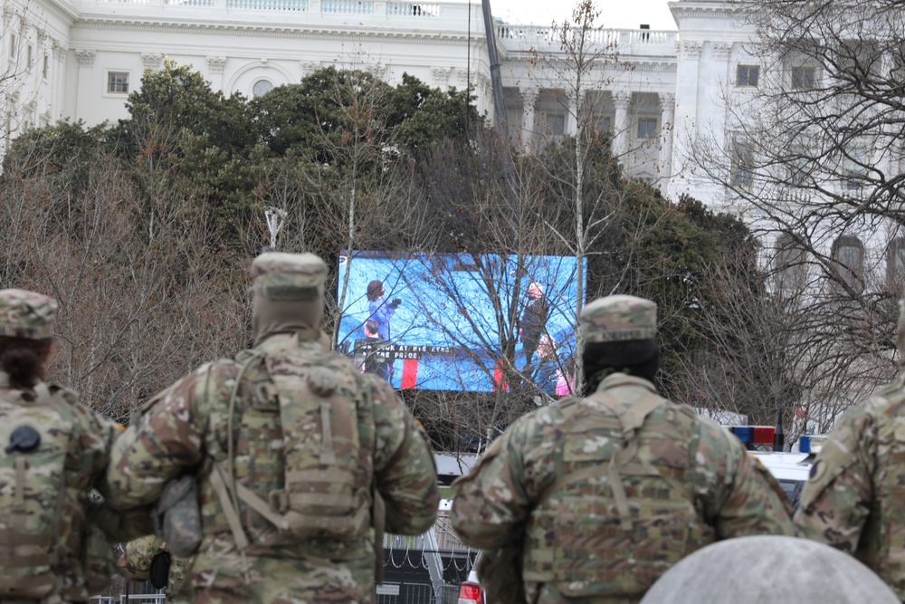 National Guard Soldiers watch the 59th Presidential Inauguration.