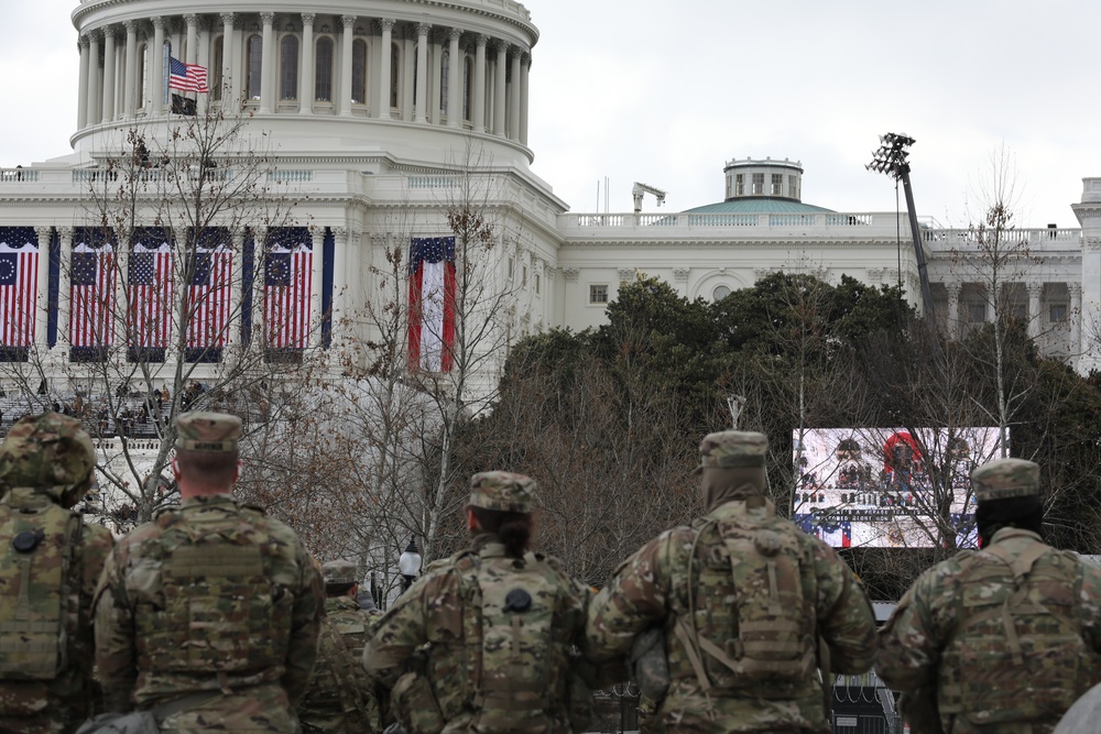 National Guard Soldiers watch the 59th Presidential Inauguration.