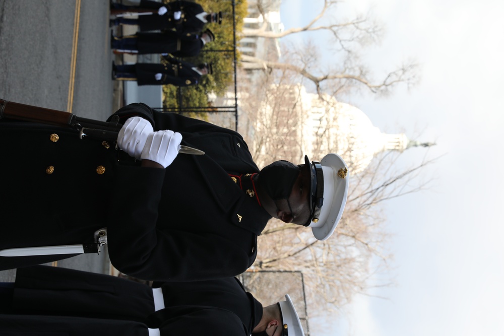 Members of the United States Joint Forces Color Guard stand in formation before the start of the 59th Presidential Inauguration parade.