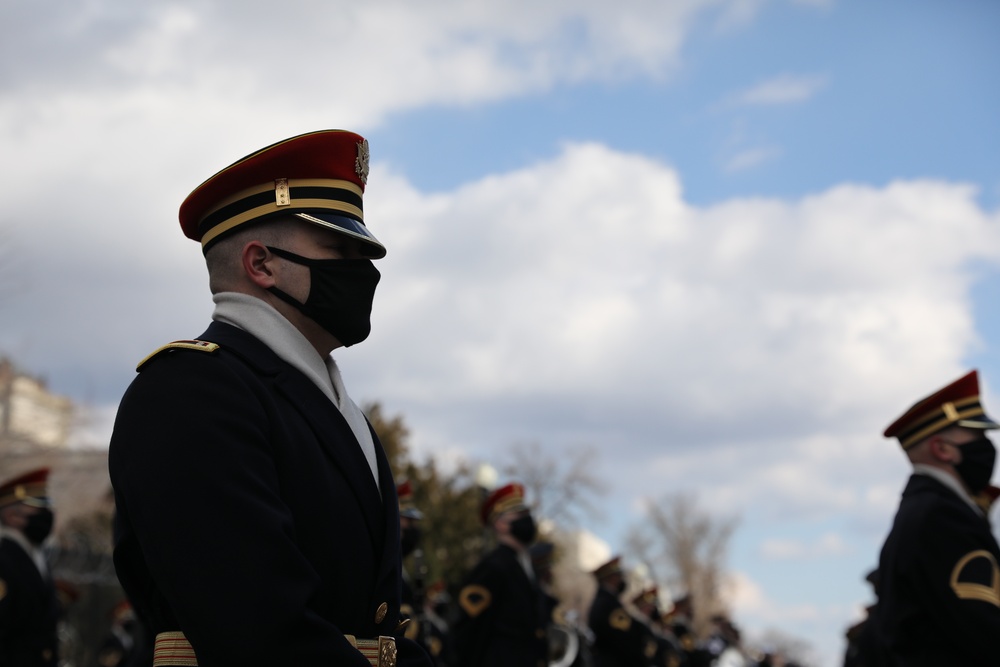 Members of the United States Joint Forces Color Guard stand in formation before the start of the 59th Presidential Inauguration parade.