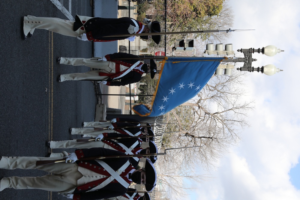 Members of the United States Joint Forces Color Guard stand in formation before the start of the 59th Presidential Inauguration parade.