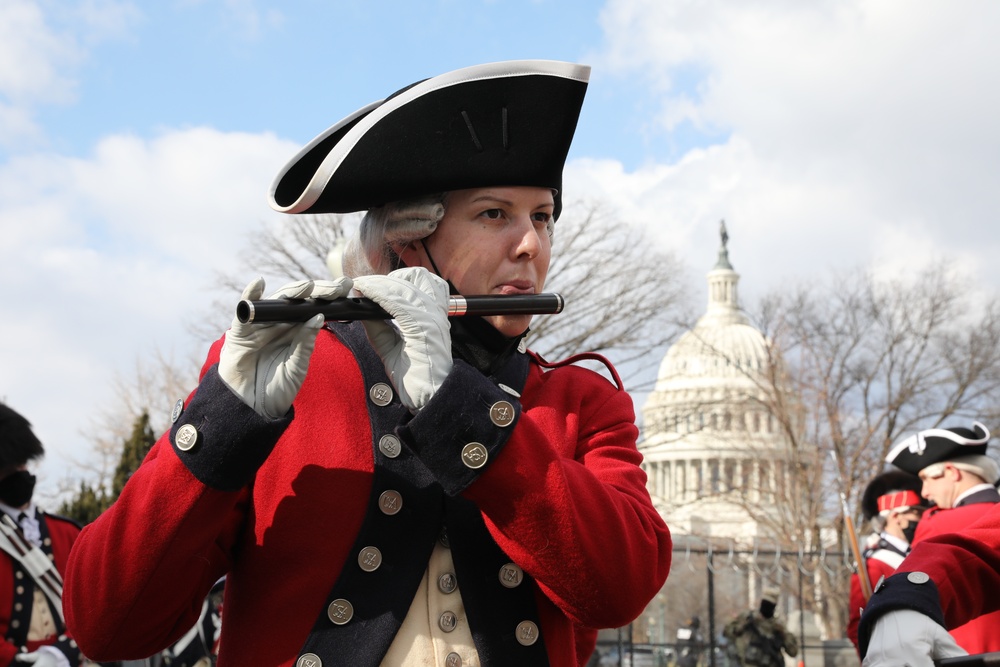 Members of the United States Joint Forces Color Guard stand in formation before the start of the 59th Presidential Inauguration parade.