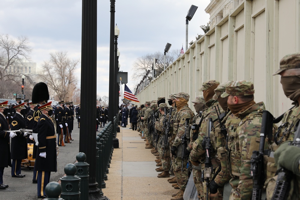 United States Joint Forces Color Guard Flag Detail arrives signaling the start of the 59th Presidential Inauguration Parade.