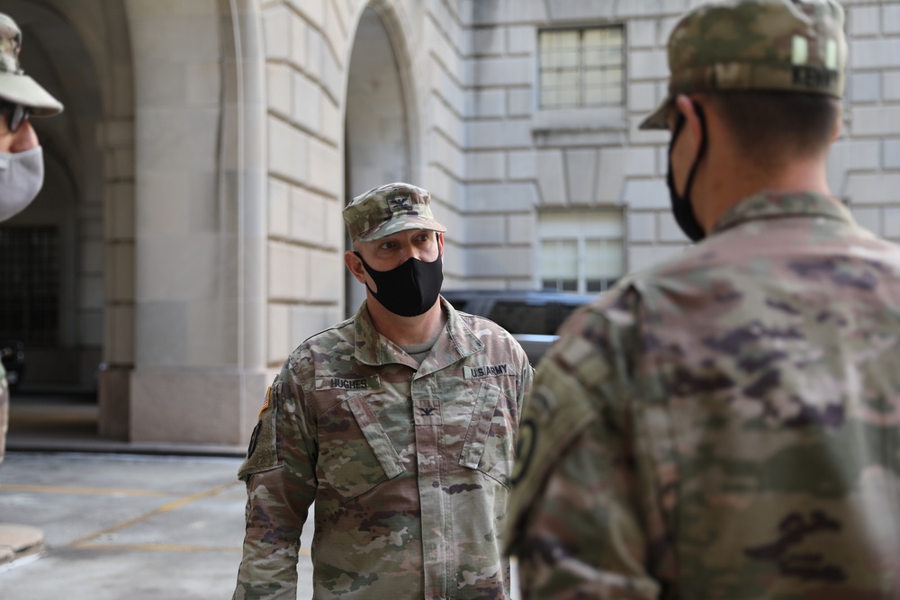 Col. Hughes talks a members of the New Jersey National Guard’s Joint Task Force Iron Guard in Washington, D.C.