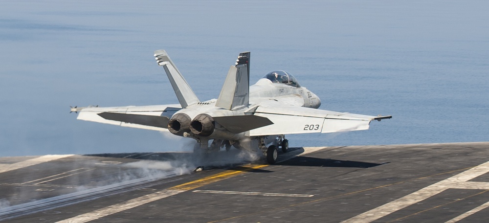 An F/A-18F Super Hornet Launches from the Flight Deck of Nimitz