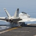 An F/A-18F Super Hornet Launches from the Flight Deck of Nimitz