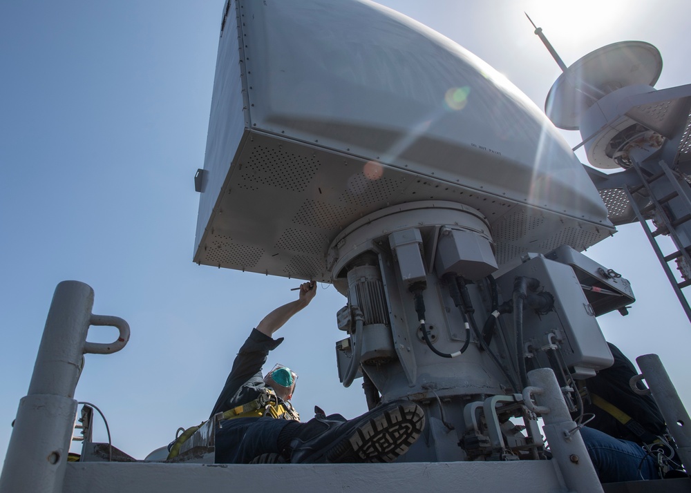 Sailor Performs Maintenance