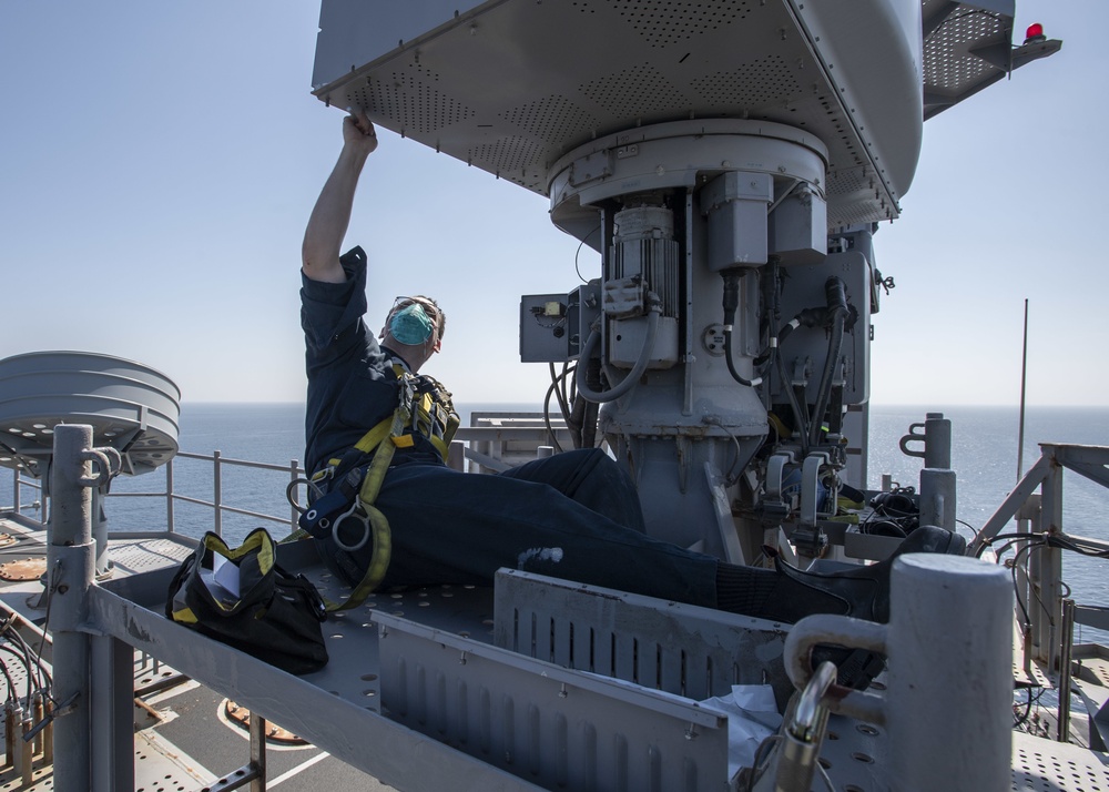 Sailor Performs Maintenance