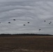 Brazilian Paratroopers parachuting in gray sky at JRTC 21-04.