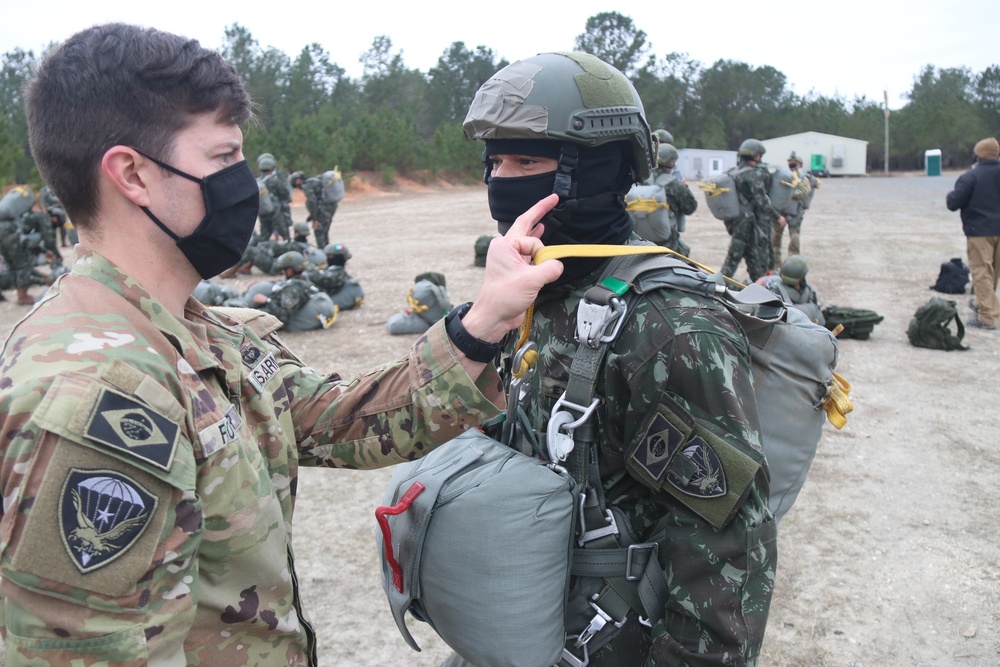 Brazilian Paratrooper inspected by U.S Army jumpmaster before jump at JRTC 21-04