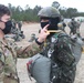 Brazilian Paratrooper inspected by U.S Army jumpmaster before jump at JRTC 21-04