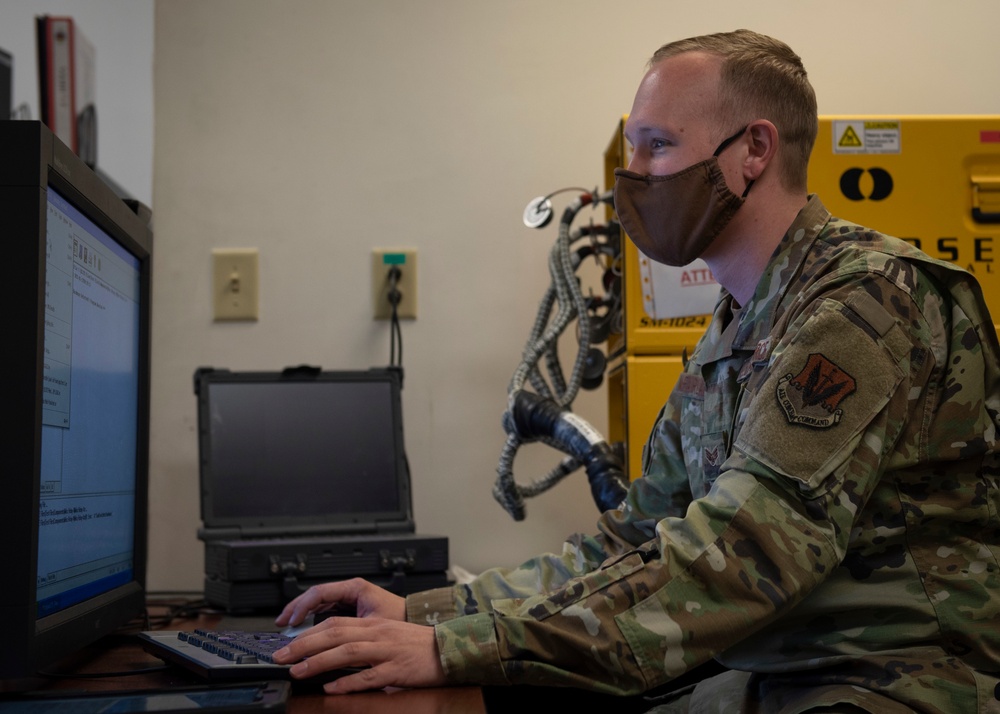 4th CMS Electrical and Environmental Airmen test F-15E Strike Eagle Components