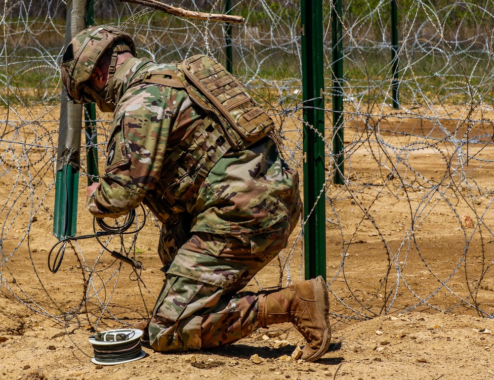 39th Brigade Engineer Battalion practices breaching of mined wire obstacle