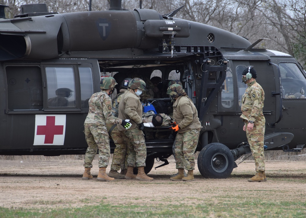 433rd ASTS trains in receiving incoming patients aboard Black Hawks