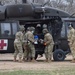 433rd ASTS trains in receiving incoming patients aboard Black Hawks
