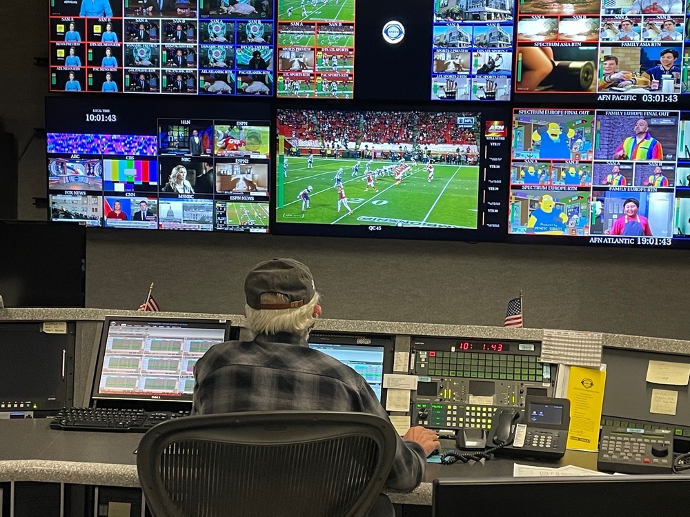 Audio-Visual Production Specialist Monitors Live Broadcasts