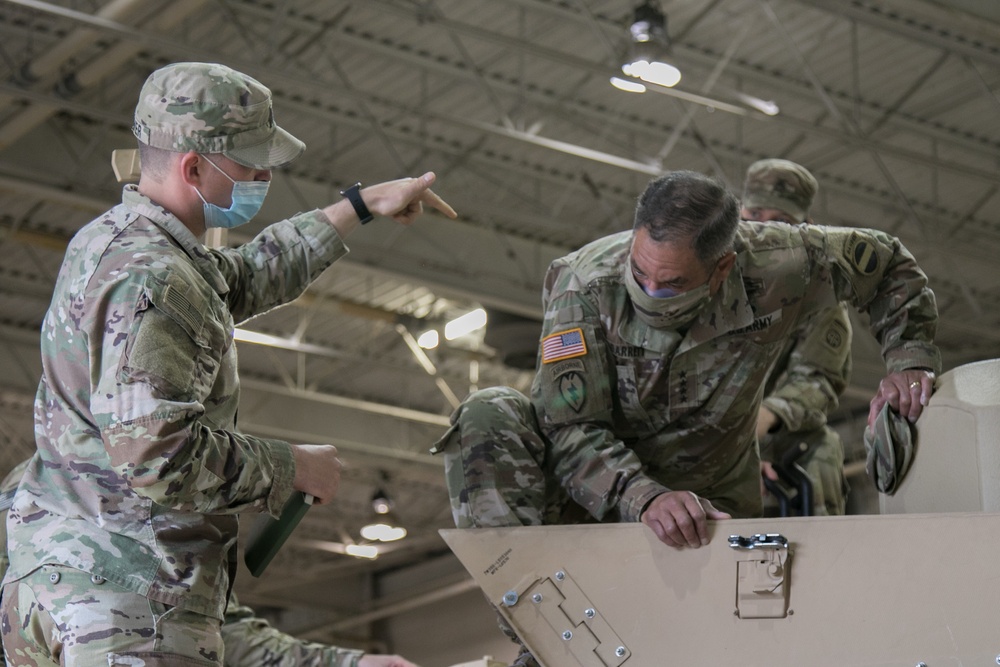 Gen. Michael Garrett views tank prototype and interacts with Paratroopers