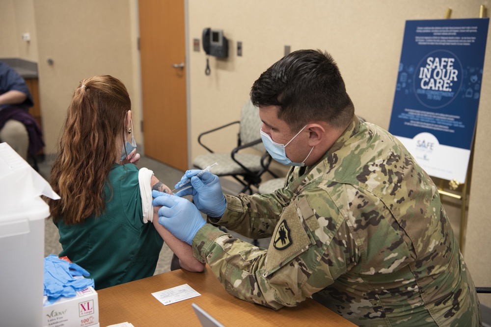 South Carolina National Guard assists hospital administer COVID-19 vaccine