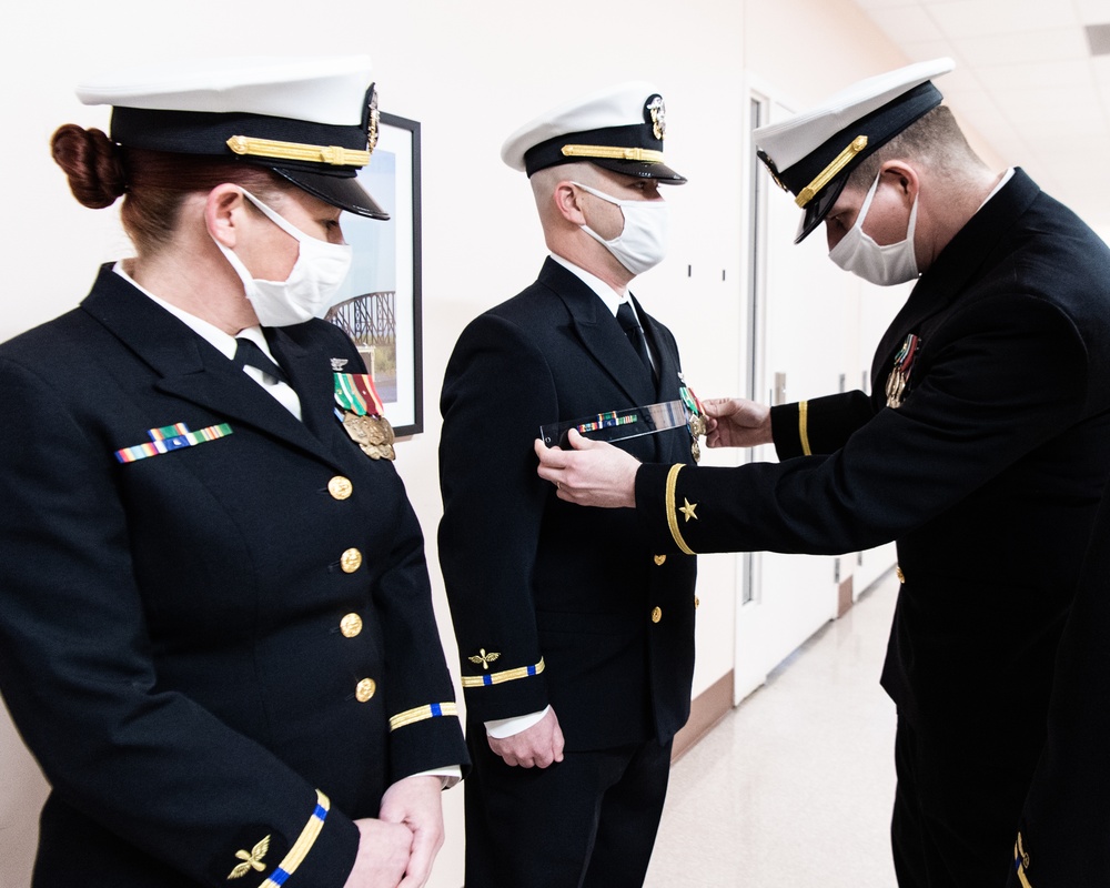 210126-N-TE695-0002 NEWPORT, R.I. (Jan. 26, 2021) LDO/CWO Academy class conducts uniform inspection