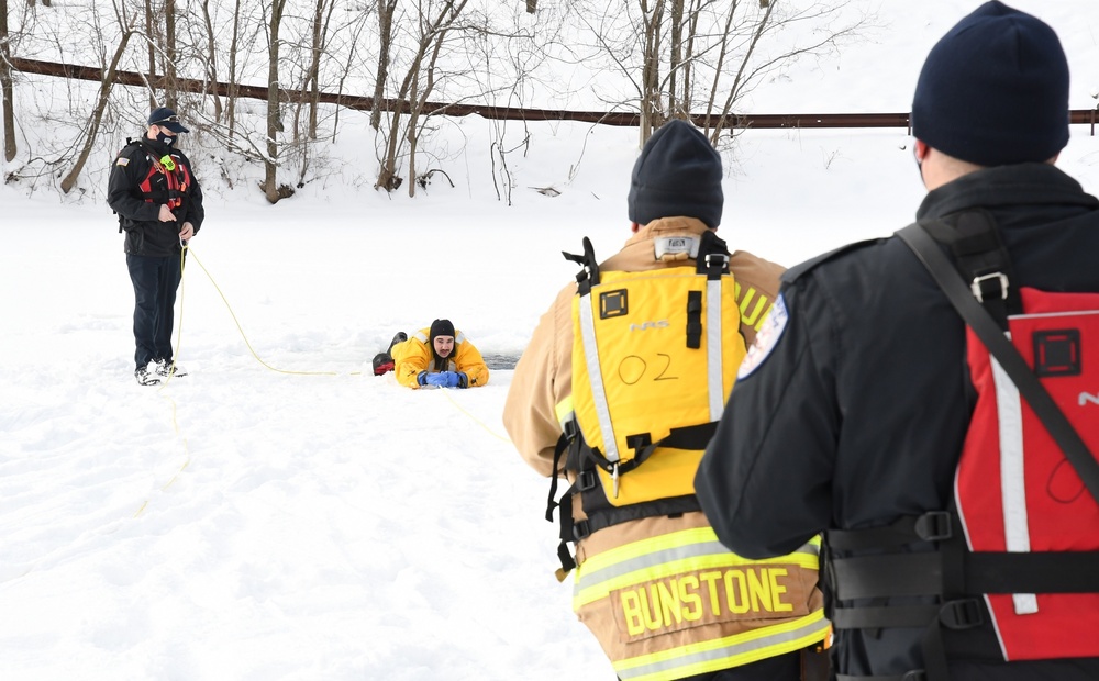 Fort Drum firefighters train on Remington Pond for cold-weather rescues