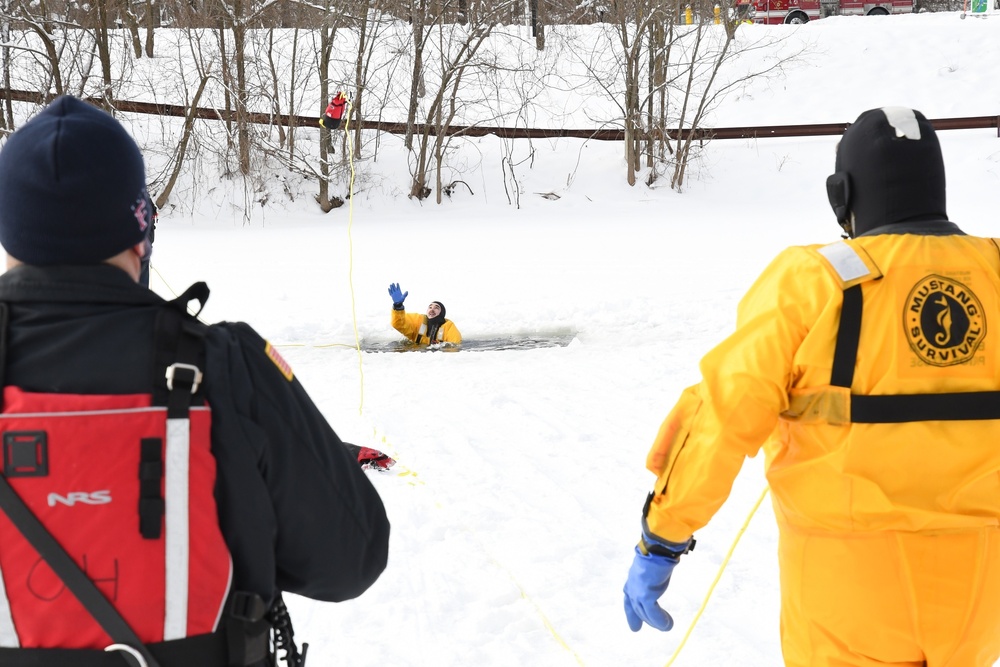 Fort Drum firefighters train on Remington Pond for cold-weather rescues