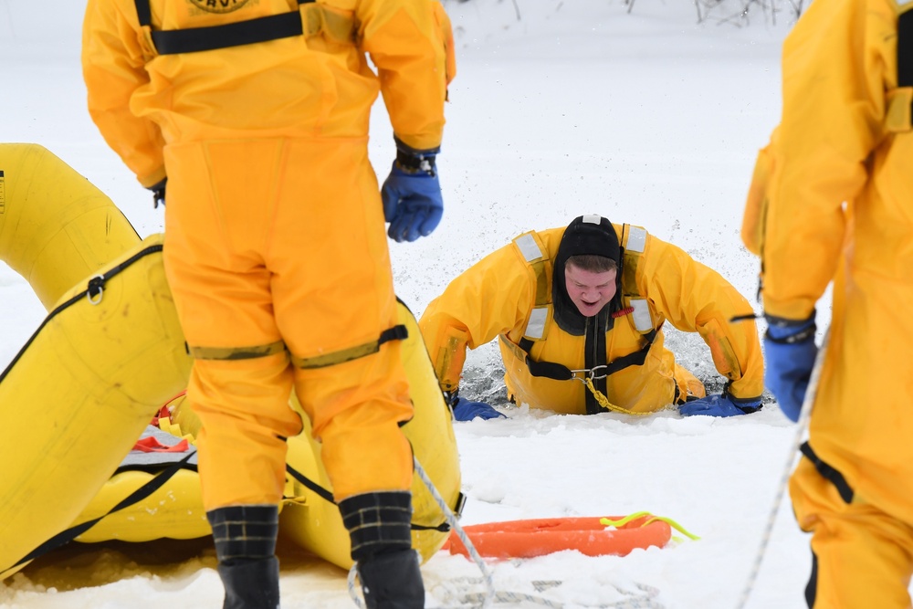 Fort Drum firefighters train on Remington Pond for cold-weather rescues