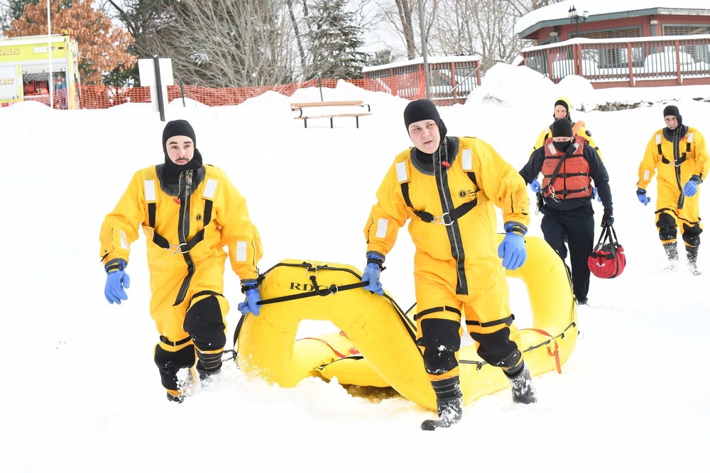 Fort Drum firefighters train on Remington Pond for cold-weather rescues