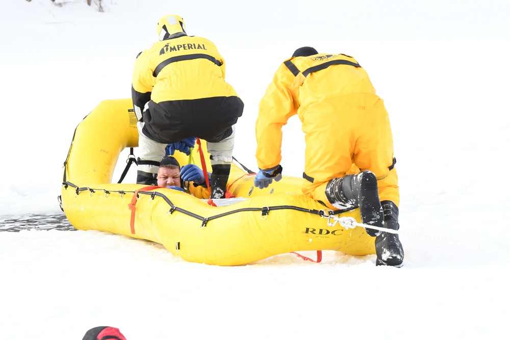 Fort Drum firefighters train on Remington Pond for cold-weather rescues