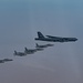 B-52 Stratofortresses fly in formation with U.S. Air Force F-15E Strike Eagles, Saudi Royal Air Force fighter jets, and U.S. Navy F/A-18 Hornets