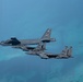 B-52 Stratofortresses fly in formation with U.S. Air Force F-15E Strike Eagles, Saudi Royal Air Force fighter jets, and U.S. Navy F/A-18 Hornets