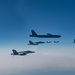 B-52 Stratofortresses fly in formation with U.S. Air Force F-15E Strike Eagles, Saudi Royal Air Force fighter jets, and U.S. Navy F/A-18 Hornets