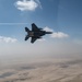 B-52 Stratofortresses fly in formation with U.S. Air Force F-15E Strike Eagles, Saudi Royal Air Force fighter jets, and U.S. Navy F/A 18 Hornets