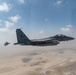 B-52 Stratofortresses fly in formation with U.S. Air Force F-15E Strike Eagles, Saudi Royal Air Force fighter jets, and U.S. Navy F/A 18 Hornets