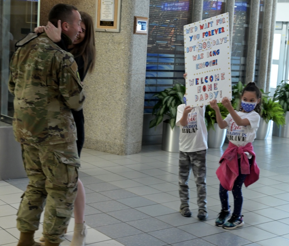 U.S. Airmen from 126th Civil Engineer Squadron and 126th Force Support Squadron return home from a six month deployment to Africa.