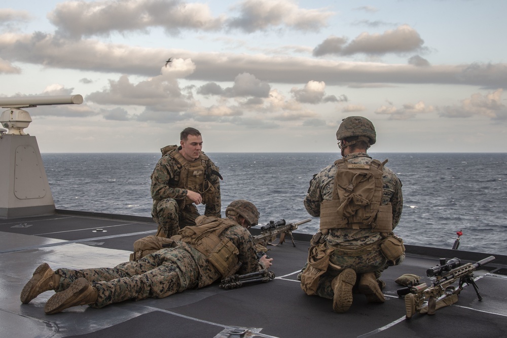 Snipers provide over-watch during VBSS mission